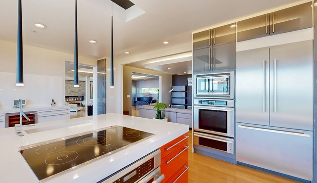 Dog-friendly bay-view home with deck, private saltwater pool, fireplaces, grill