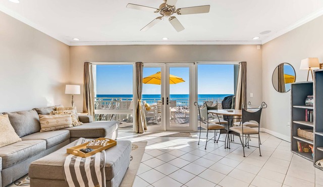 Dog-friendly, beachfront dream with a wet bar & two furnished balconies