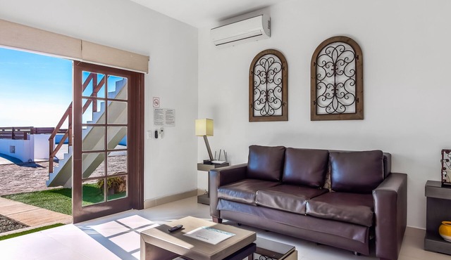 Dog-friendly beach haven with heated pool, hot tub, kitchenette, patio, AC