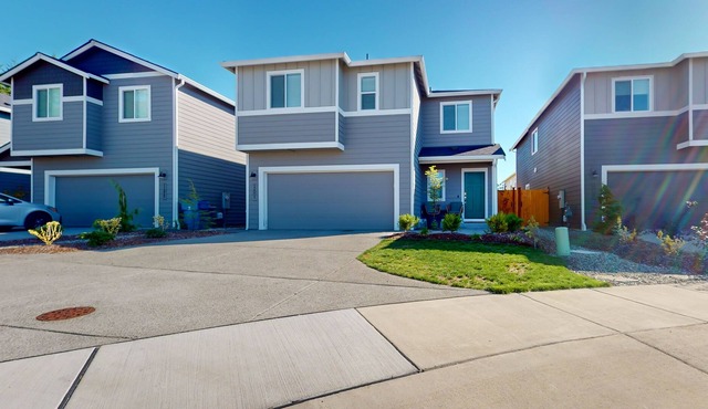 Dog-friendly bohemian home with enclosed yard, fireplace, & basketball court