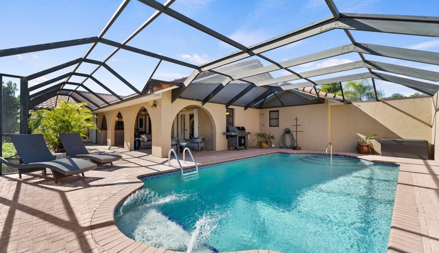 Dog-Friendly Canal-Front Home with Heated Pool, Dock, Screened Lanai & Free WiFi