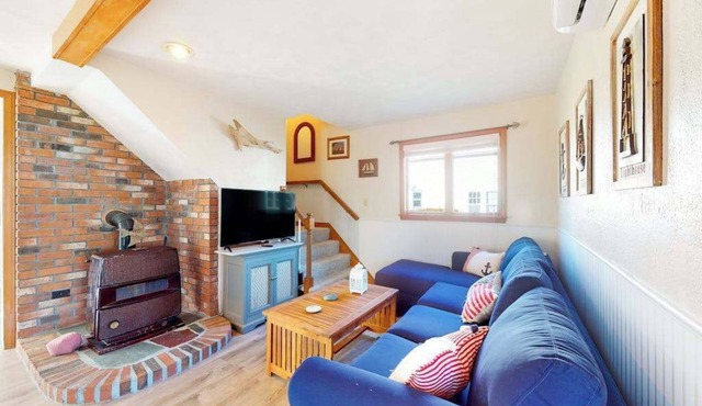 Dog-friendly coastal home steps from beach with grill, firepit, & washer/dryer