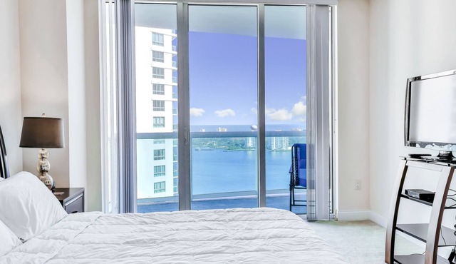 Dog-friendly coastal condo near the beach w/ river & ocean views & shared pool!