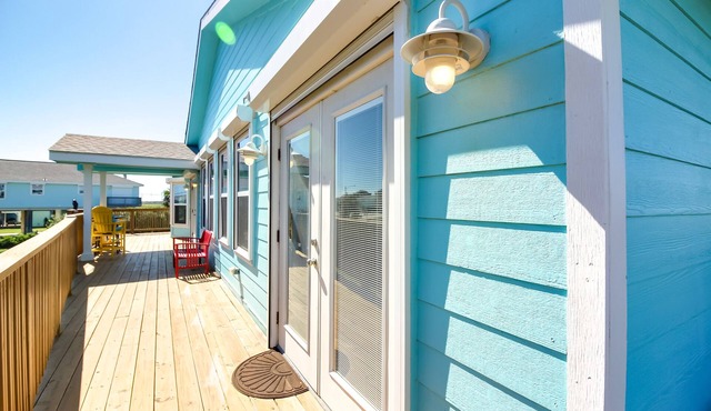 Dog-friendly cottage with two primary suites, ocean views, beach access, & deck