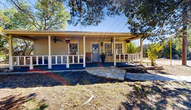 Dog-friendly country cottage with scenic hill views, wrap-around porch, and W/D