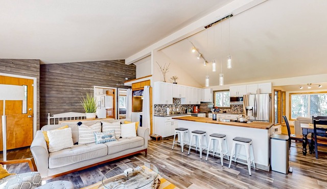 Dog-friendly, creekside home with hot tub, sauna & firepit - walk to the lake