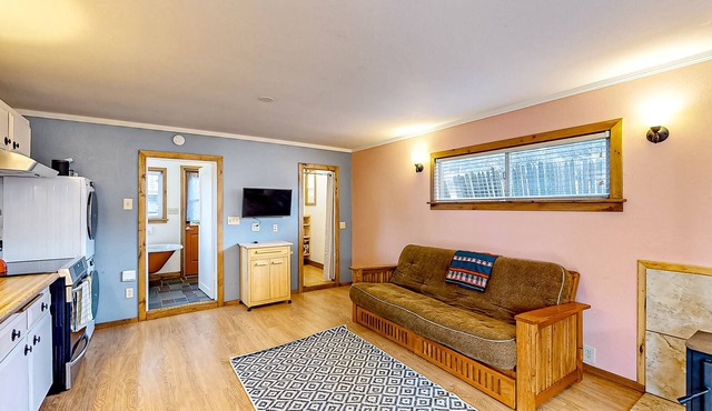 Dog-friendly, eco-conscious home with great yard & EV charger, near the beach