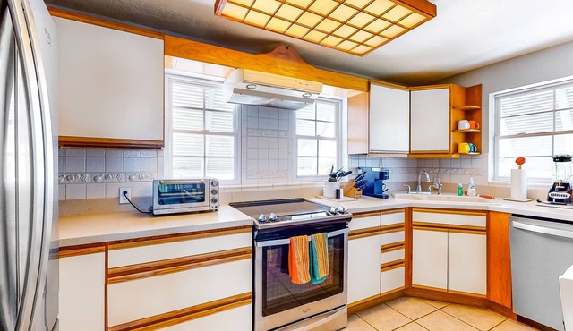 Dog-friendly escape with private dock, porch, balcony, water view, & central AC