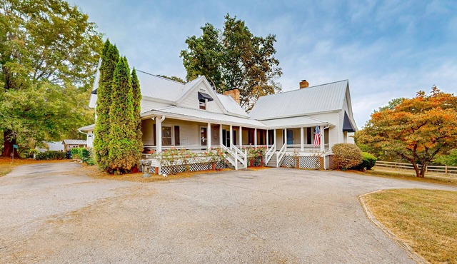 Dog-friendly farmhouse with hot tub, outdoor areas, & 3 fireplaces