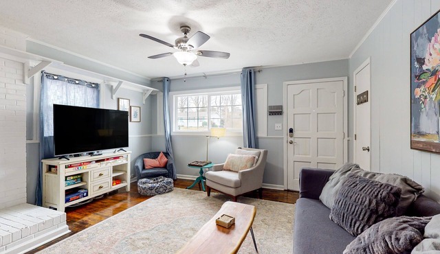 Dog-friendly hideaway with patio, smart TVs, electric fireplace, games, & AC