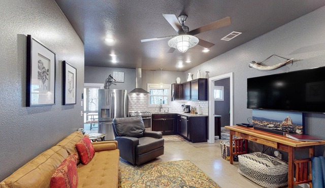 Dog-friendly home near the lake with a hot tub, firepit, grill & deck