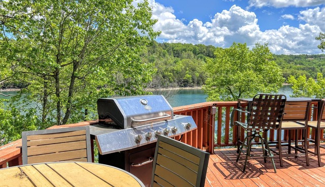 Dog-friendly home with serene views of Beaver Lake, 2 living areas & bunk room