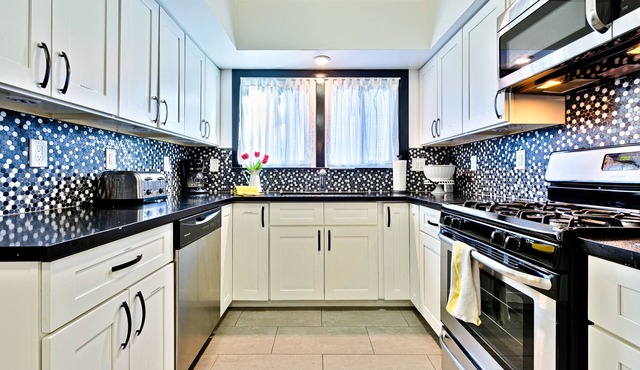 Dog-friendly home close to Disneyland with a saltwater pool, hot tub, & firepit