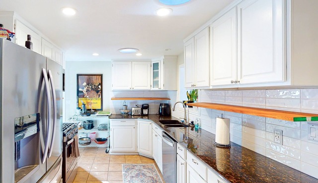 Dog-friendly home near Red Rocks with game room, deck, grill, & firepit