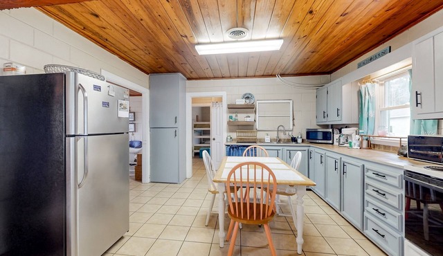 Dog-friendly home near water with foosball, bikes, grill, outdoor shower, & W/D