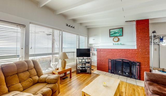 Dog-friendly home with deck & ocean views - close to the beach