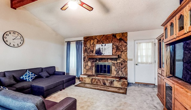 Dog-friendly home with a wood-burning fireplace, board games, W/D, and patio