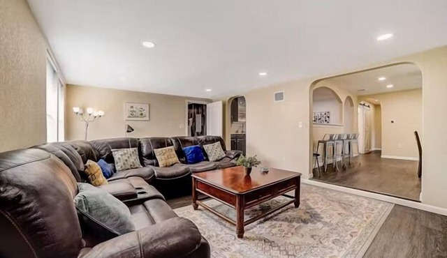dog-friendly home with fenced yard, grill, sunroom