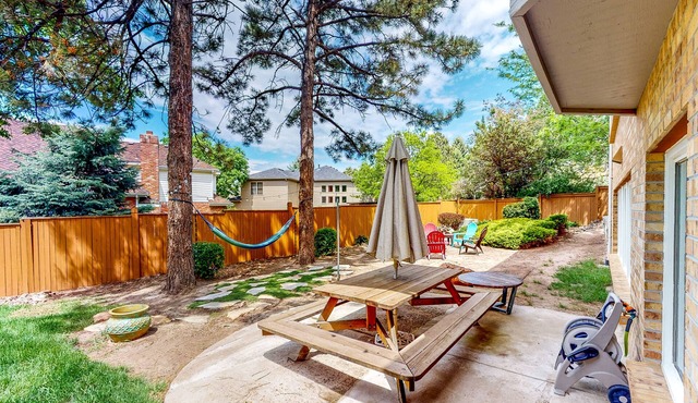 Dog-friendly home with large, enclosed yard, gourmet kitchen, & washer/dryer