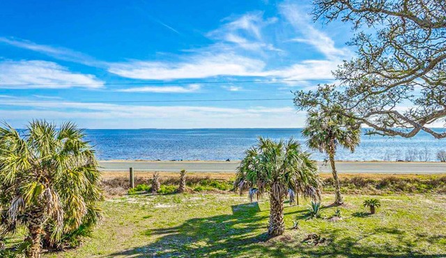 Dog-friendly home with lovely water view, roomy deck, fast WiFi, central AC, W&D
