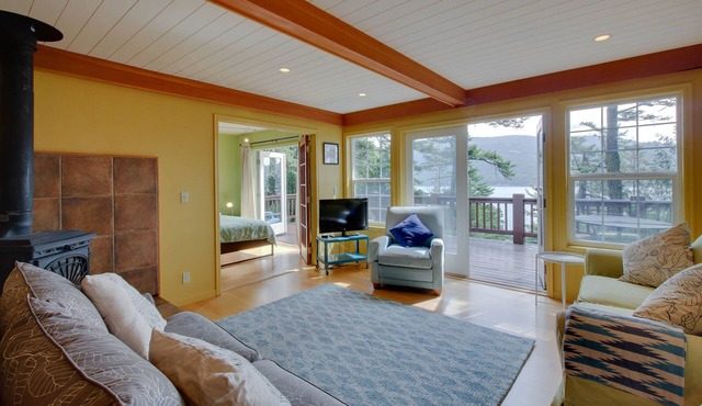 Dog-friendly home with deck, firepit & sound views