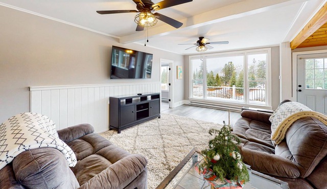 Dog-friendly home with gorgeous mountain view, large deck/yard & woodstove