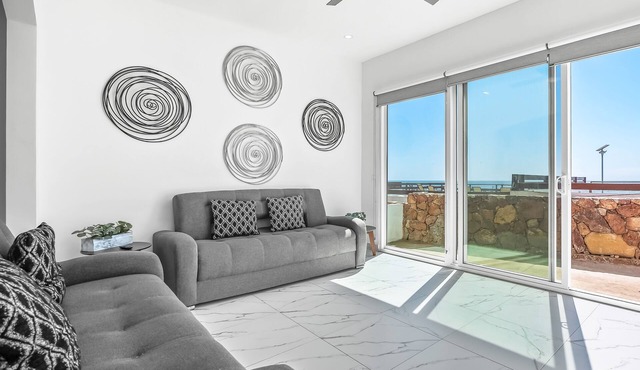 Dog-friendly home with heated pool, hot tub, partial ocean views, & balcony