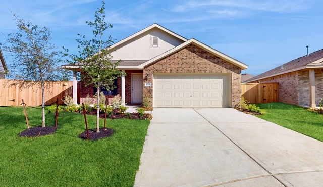 Dog-friendly home with a large, fenced yard, washer/dryer, & central AC
