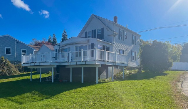 Dog-friendly home with a partial river view & deck - steps from park & beach