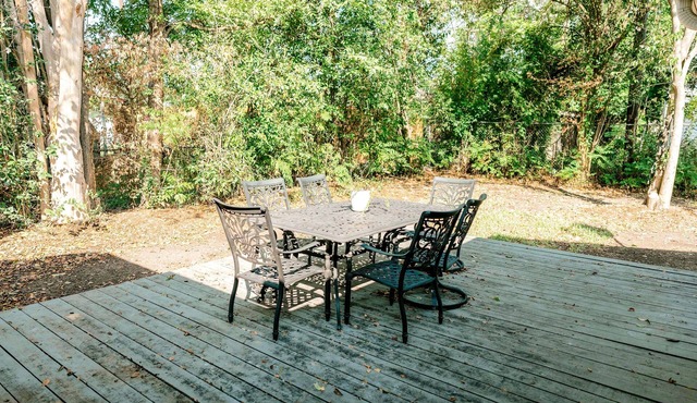 Dog-friendly home with private yard, furnished deck, central AC, & W/D