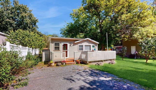 Dog-friendly home with fenced backyard & W/D - lake trails across the street