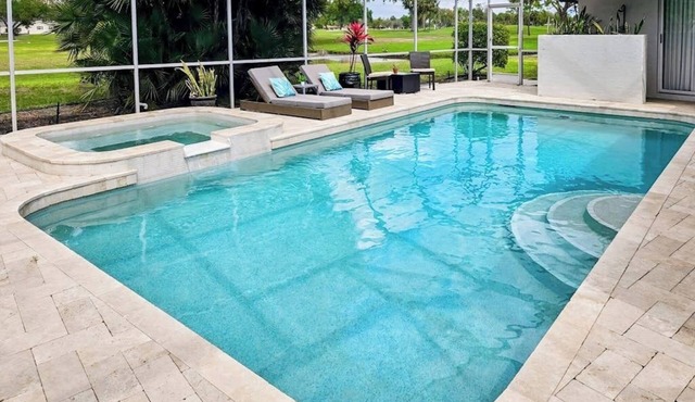 Dog friendly home with private pool, on golf course, and washer and dryer