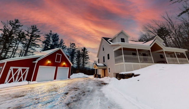 Dog-friendly house near skiing with mountain view, game room, fireplace, & grill