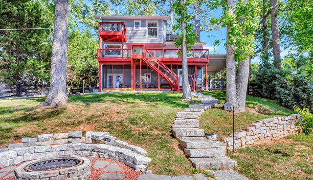 Dog-friendly lake house with dock, decks, firepit, grill, fireplace, & WiFi