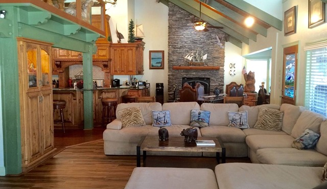 Dog-friendly, lake view home with a boat slip, three decks, & WiFi