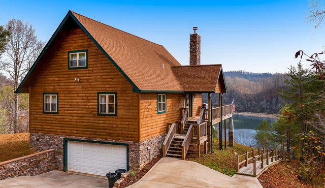 Dog-friendly lakefront house with hot tub, central AC, & mountain view