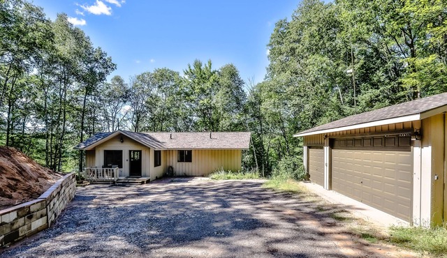 Dog-friendly, lakefront retreat with a dock, washer/dryer, central AC, & firepit