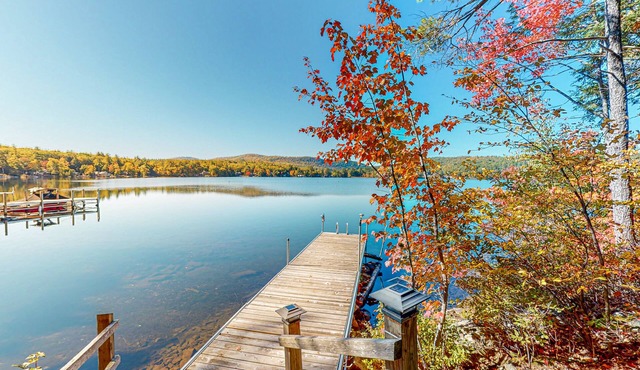 Dog-friendly lakefront cottage with private beach and dock, lake views, and W/D
