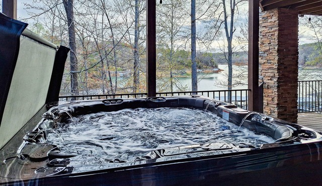 Dog-friendly, lakefront home with two decks, fireplace, two kitchens, & dock