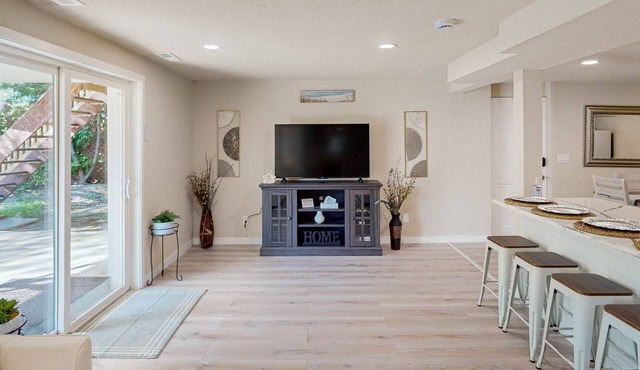 Dog-friendly lakefront getaway with a kitchenette, furnished patio, & fast WiFi