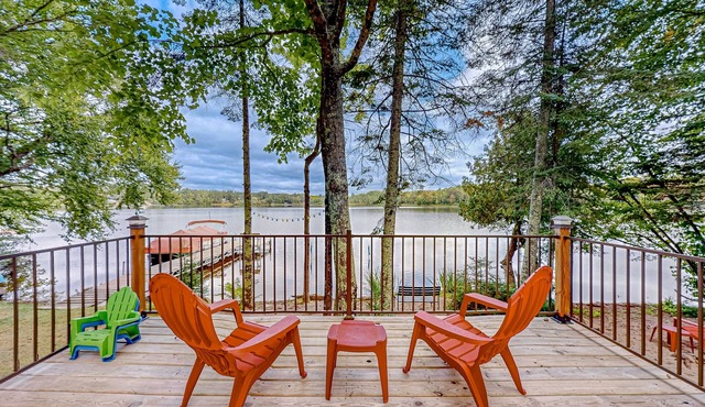 Dog-friendly lakefront home with a private beach, dock, firepit, & kayaks