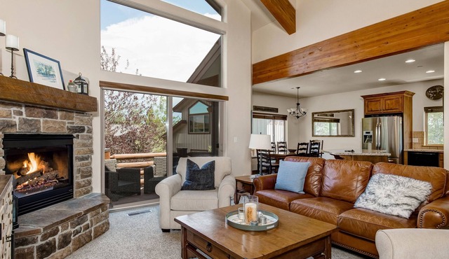 Dog-friendly, light-filled home with deck, gas fireplace & great location