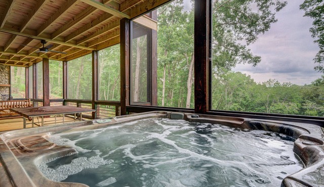 Dog Friendly Lodge near town with screened deck, hot tub, game room & WiFi