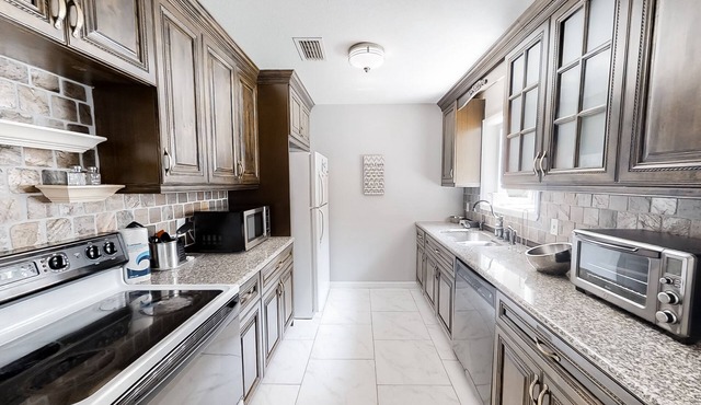 Dog-friendly retreat with a private saltwater pool, inviting patio & W/D