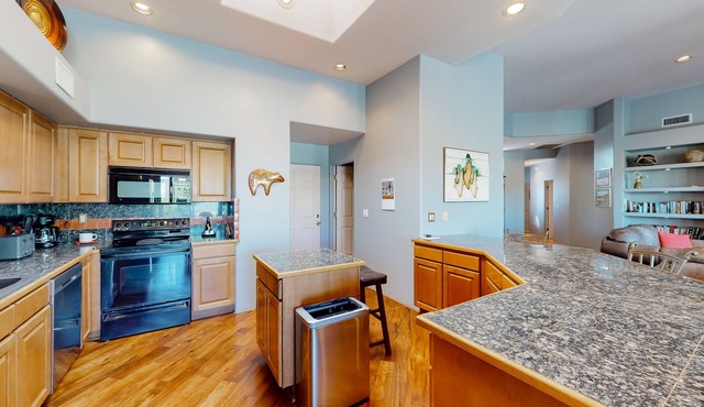 Dog-friendly retreat with lovely outdoor living space, central AC, & home office