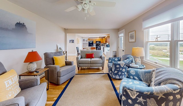 Dog-friendly river view home with gas grill, patio, TV, washer/dryer, & kitchen