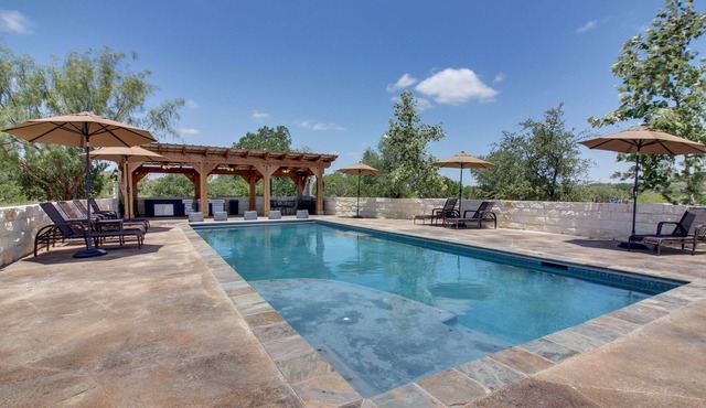 Dog-friendly riverfront home with private pool, gourmet amenities, & guesthouse