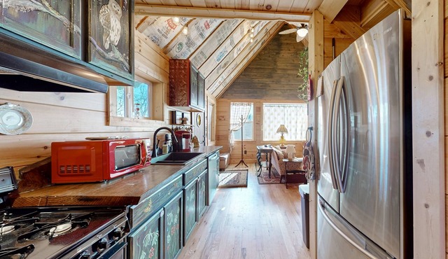 Dog-friendly riverfront home near FloydFest with fireplace, river views, & deck