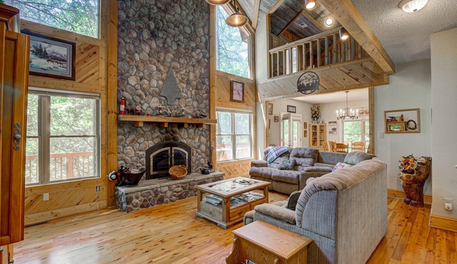 Dog-friendly riverfront cabin w/waterfall view, large decks, firepit, Ping-Pong