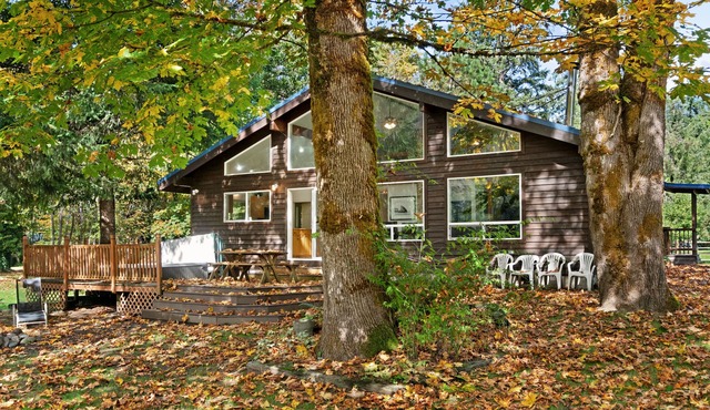 Dog-friendly riverfront cabin w/Private Hot Tub, Wood Stove, near Ski resort